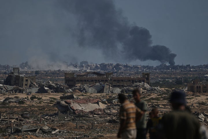Smoke rises to the sky following an Israeli military strike in Gaza City, as seen from the central Gaza Strip, Thursday, Oct. 2, 2025. (AP Photo/Abdel Kareem Hana)