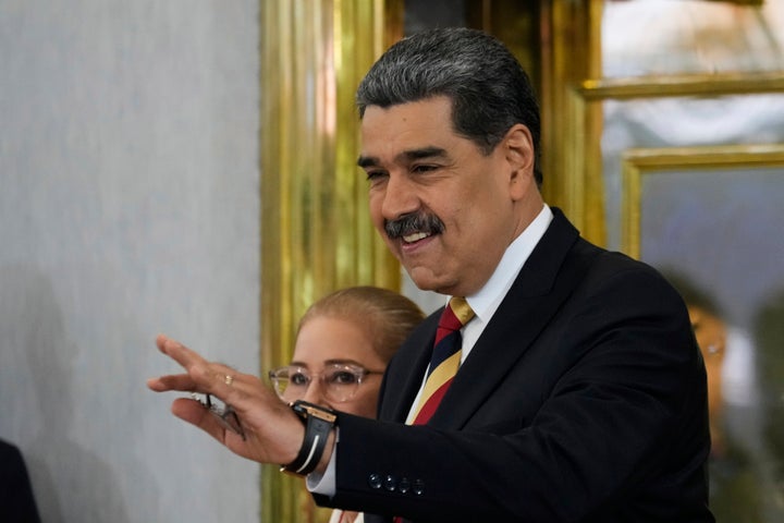 Venezuela President Nicolas Maduro arrives for a press conference in Caracas, Venezuela, Monday, Sept. 1, 2025. (AP Photo/Ariana Cubillos)
