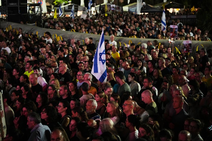 People attend a rally calling for the release of all hostages held by Hamas in the Gaza Strip and urges a ceasefire, in Tel Aviv, Israel, Saturday, Oct. 4, 2025. ahead of the second anniversary of the Israel-Hamas war. (AP Photo/Ohad Zwigenberg)