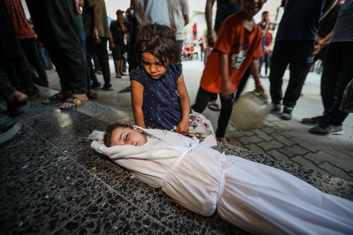 GAZA CITY, GAZA - OCTOBER 4: (EDITOR'S NOTE: Image depicts death) Body of a Palestinian child, who lost his life following the Israeli attack on al-Tuffah neighborhood, is brought to al-Ahli Hospital for funeral process in Gaza City, Gaza on October 4, 2025. (Photo by Hamza Z. H. Qraiqea/Anadolu via Getty Images)