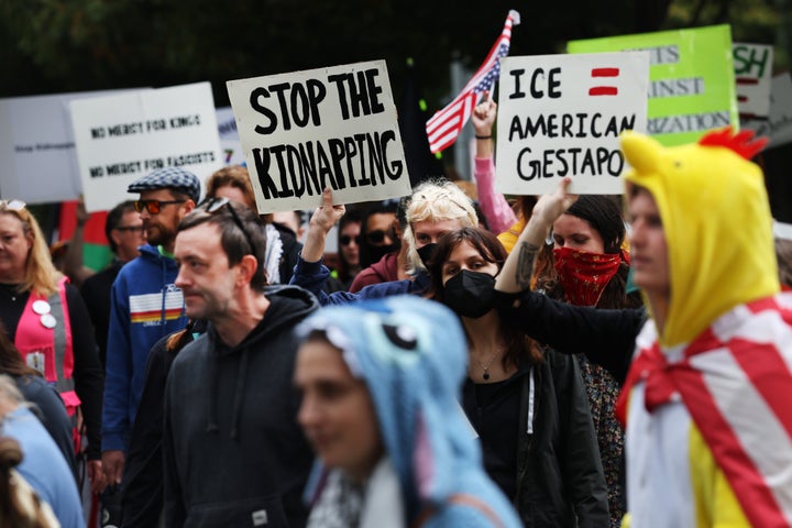 PORTLAND, OREGON - OCTOBER 04: Protesters head towards a downtown U.S. Immigration and Customs Enforcement (ICE) facility on October 04, 2025 in Portland, Oregon. The facility has become a focal point of nightly protests against the Trump administration and his announcement that he will be sending National Guard troops into Portland. (Photo by Spencer Platt/Getty Images)