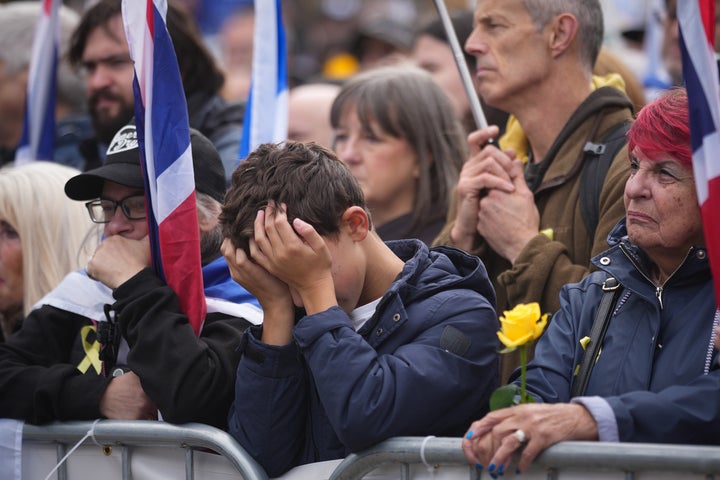People attend an event honoring the lives lost on Oct. 7, 2023, and the recent attack on the Heaton Park Hebrew Congregation Synagogue, on Oct. 5, 2025 in Manchester, England. A stabbing and car attack on the synagogue killed two people and hospitalized four others on Yom Kippur, the holiest day of the Jewish calendar.