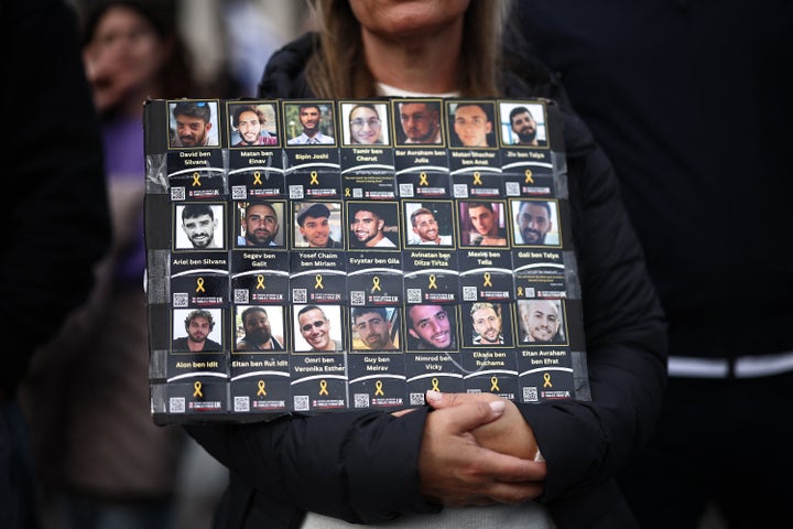 Rubio Says Gaza Offensive Is not Over But, As Israel Retains Pounding Determined Palestinians 3 People at an event organized by the Jewish community hold photos of Hamas hostages to mark the second anniversary of Hamas' Oct. 7 attack on Israel, in London on Oct. 5, 2025.