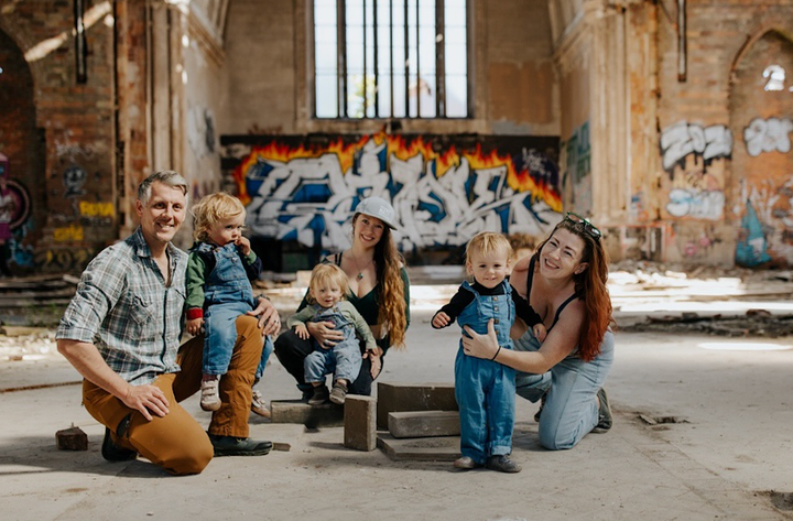 The babies at age 2 with the author (right), her wife, and the babies' bio dad in a historic Detroit church.
