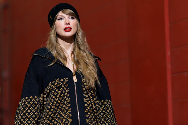Taylor Swift, pictured here at a Kansas City Chiefs game in January, is under criticism for her latest album, which some fans call tone deaf.
