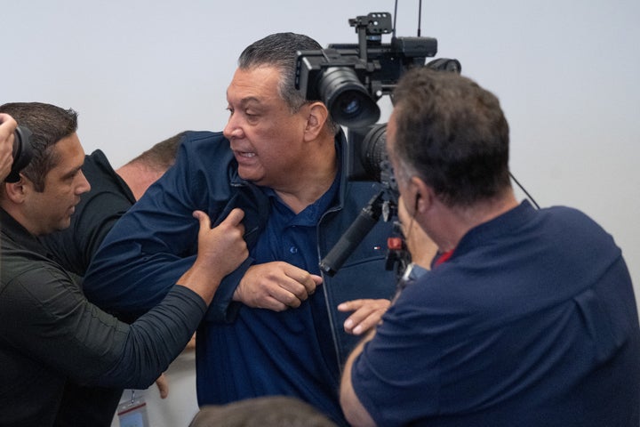 Sen. Alex Padilla was pushed out of the room as Homeland Security Secretary Kristi Noem holds a news conference in Los Angeles back in June 12.