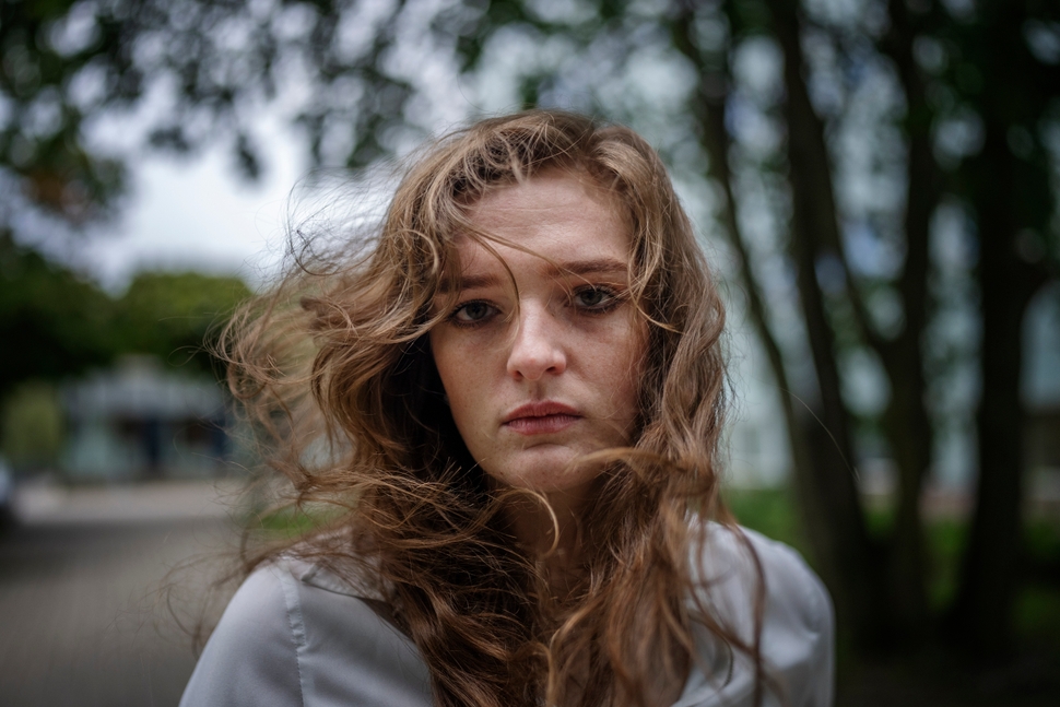 Raelynn Bumgardner, seen last month in the courtyard of her home in Stockholm, says the conditions at Spring Ridge were enough to force her to run away, with the hopes that someone at a neaby motel would take her to Texas.