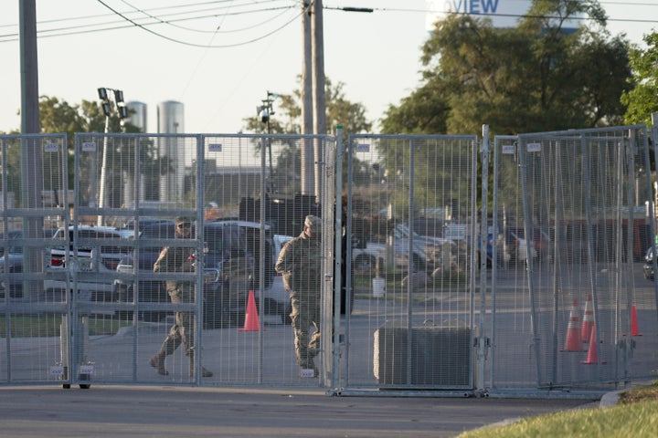 Personnel walk inside an immigration processing facility in Broadview, Ill., on Thursday, Oct. 9, 2025. (AP Photo/Laura Bargfeld)