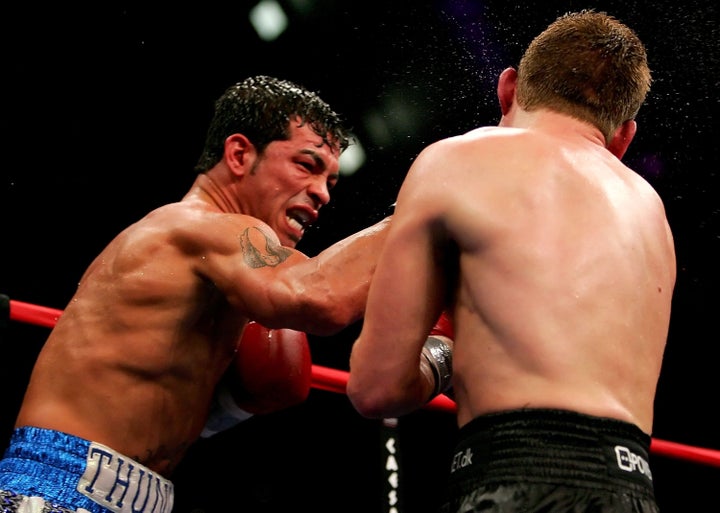 Gatti Sr. (left), seen here fighting Thomas Damgaard in Atlantic City, New Jersey, in 2006.