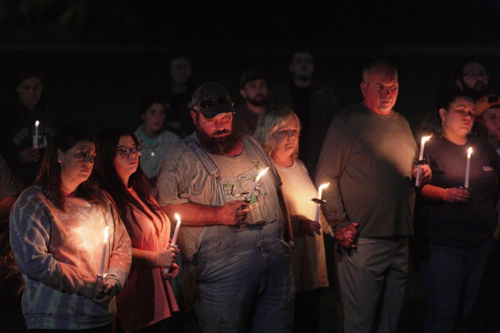 Residents attend a vigil honoring the victims of a blast at an explosives plant, Accurate Energetic Systems, on Friday, Oct. 10, 2025, in Centerville Tenn. (AP Photo/Obed Lamy)