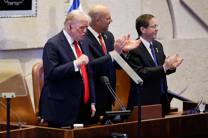 Trump Urges Leaders To Put 'Previous Feuds' Apart As He Calls For A New Period Of Concord In The Center East 1 President Donald Trump receives a standing ovation before speaking at the Knesset, Israel's parliament, on Oct. 13, 2025 in Jerusalem.