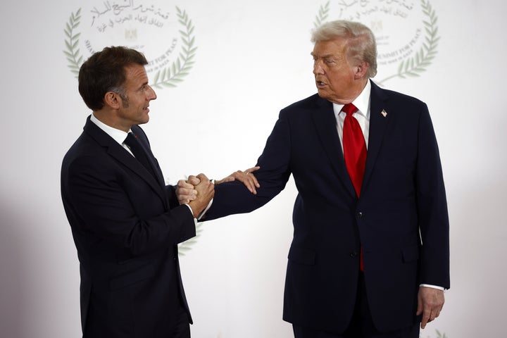 Trump-Macron handshake turns into bizarre power struggle at Egypt summit
