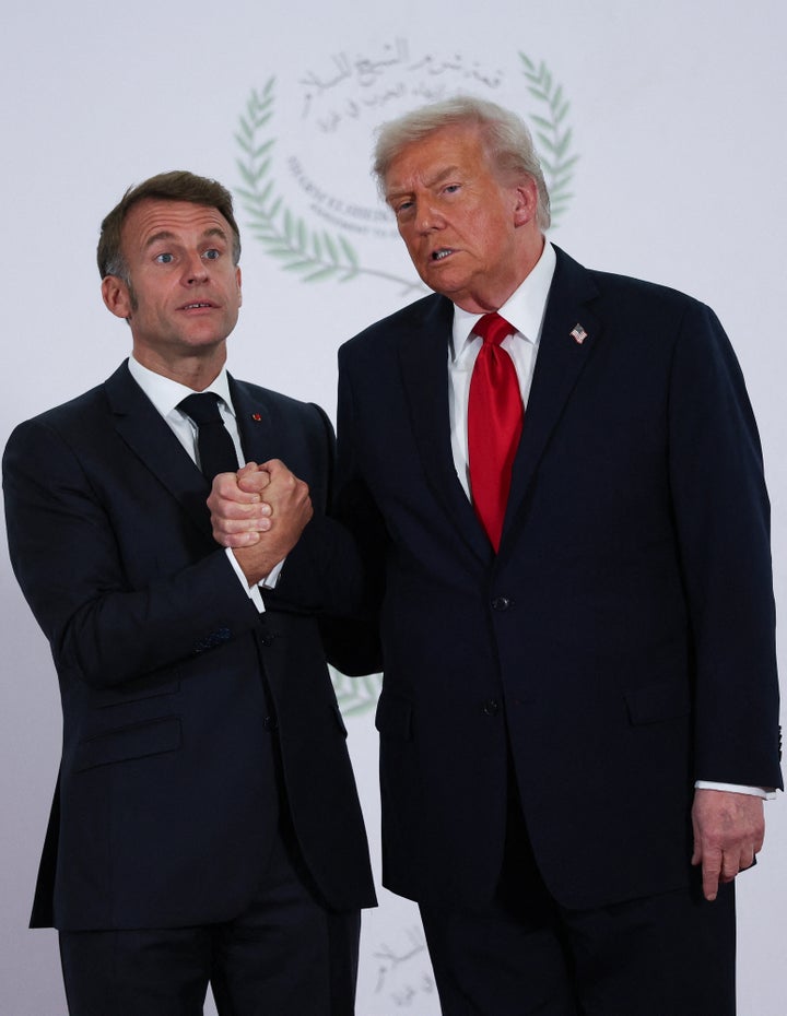 Trump-Macron handshake turns into bizarre power struggle at Egypt summit
