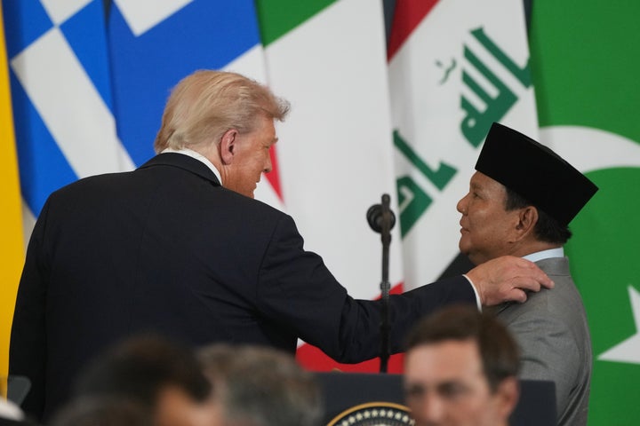 President Donald Trump, left, shares a moment with Indonesian President Prabowo Subianto during a summit to support ending the more than two-year Israel-Hamas war in Gaza after a breakthrough ceasefire deal, on Oct. 13, 2025, in Sharm El Sheikh, Egypt.