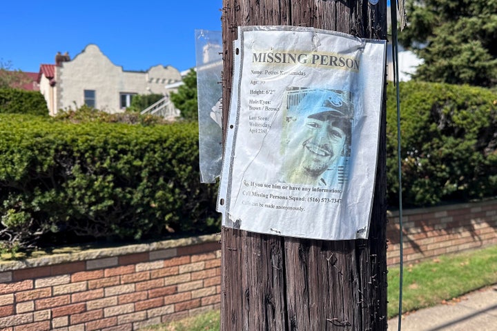A missing person flyer for Petros Krommidas hangs on a telephone pole in Long Beach in October 2025.