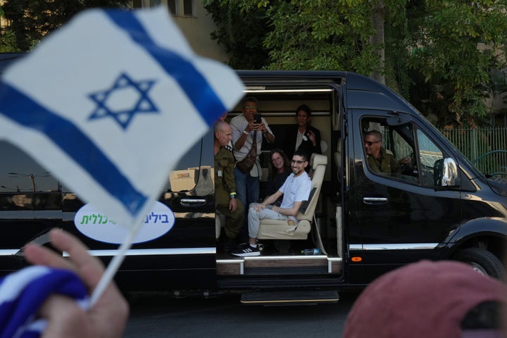 Freed Israeli hostage Evyatar David gestures from a van as he arrives at Beilinson hospital in Petah Tikva, Israel, after he was released from Hamas captivity in the Gaza Stripl, on Oct. 13, 2025.