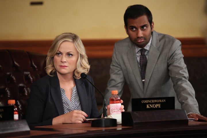 Amy Poehler as Leslie Knope and Aziz Ansari as Tom Haverford in a 2013 episode of “Parks and Recreation.”