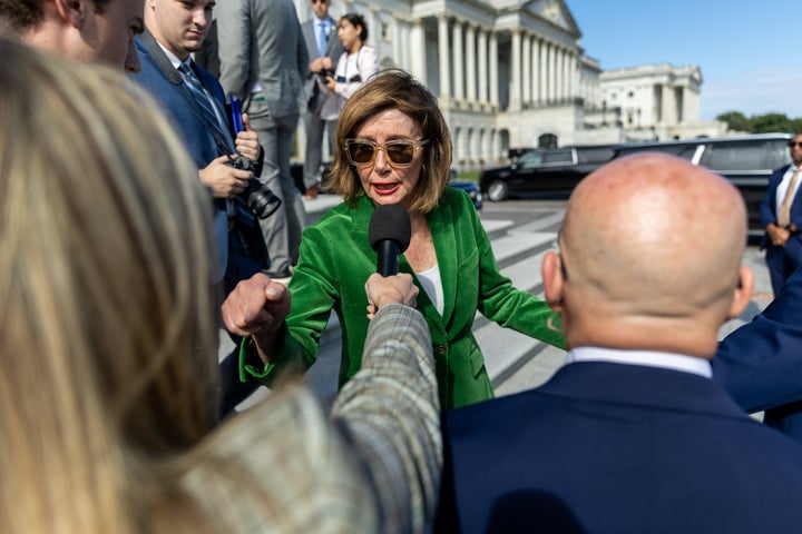 Rep. Nancy Pelosi (D-Calif.) clashed Wednesday with a pro-Donald Trump reporter who falsely claimed she was somehow to blame for the deadly riot at the U.S. Capitol on Jan. 6, 2021.