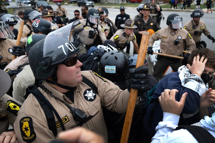BROADVIEW, ILLINOIS - OCTOBER 10: Police clash with demonstrators protesting near the immigration processing and detention facility on October 10, 2025 in Broadview, Illinois. Demonstrations have been taking place outside of the facility for several weeks as the Trump administration's Operation Midway Blitz has been underway, arresting and detaining immigrants in the Chicago area. (Photo by Scott Olson/Getty Images)