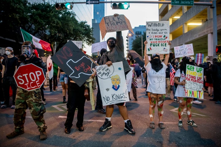 What To Know About Tomorrow's 'No Kings' Protests 2 People demonstrate against the Trump administration during the No Kings rally in downtown Austin, Texas, in June.