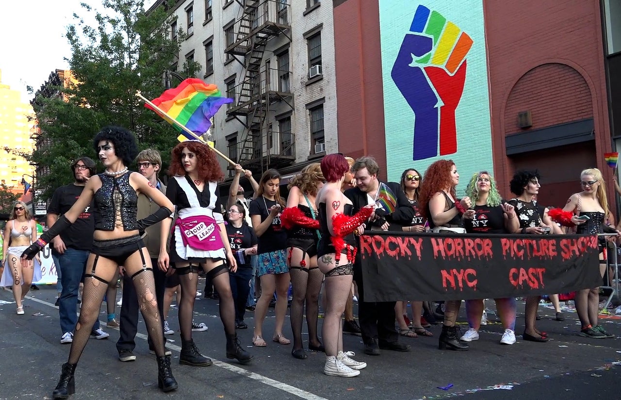 “New York City Rocky Horror Picture Show” cast members march at 2016 New York Pride.