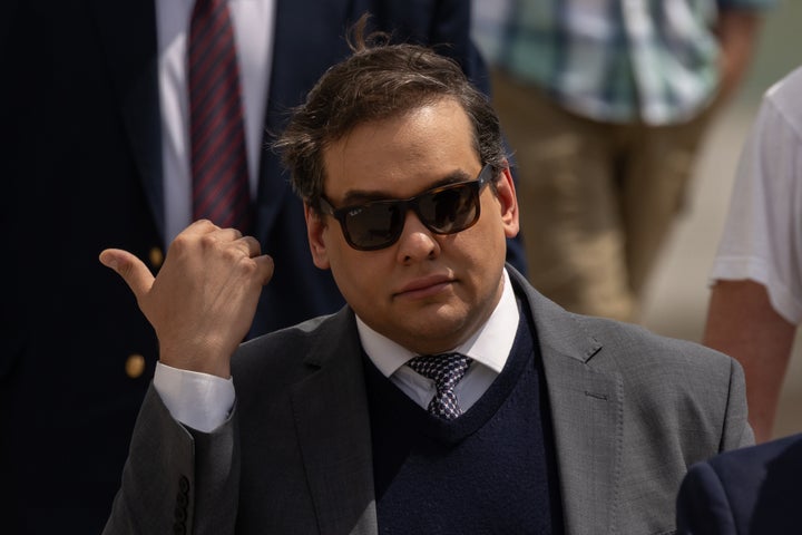 George Santos, former Representative from New York, exits federal court in Central Islip, New York, US, on Friday, April 25, 2025. Former US Representative George Santos, a onetime rising Republican star who falsely claimed to have worked for Goldman Sachs Group Inc. before running for Congress, was ordered to serve seven years and three months in prison for stealing campaign funds.