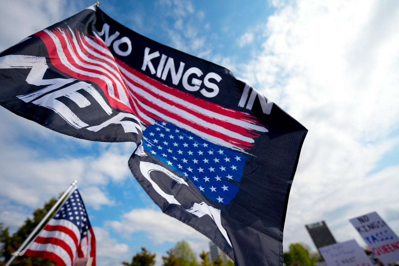 A "No Kings In America" flag waves in Birmingham, Alabama.