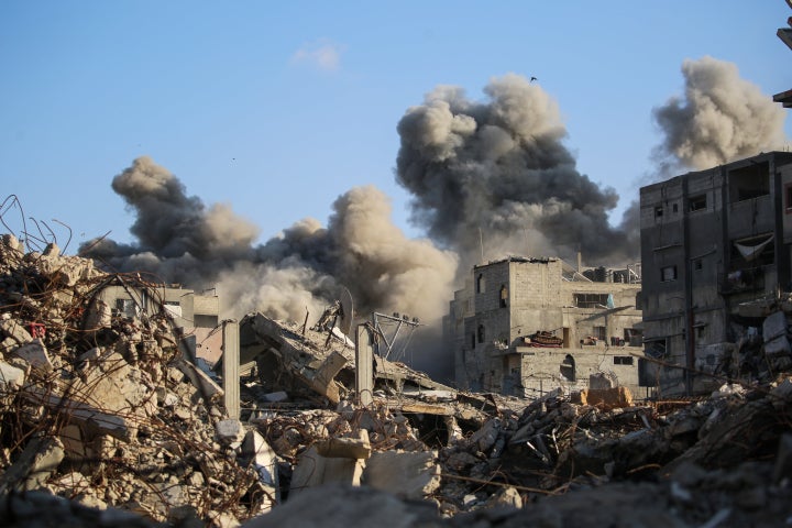 Smoke billows from an Israeli strike in the central Gaza's Bureij camp on Sunday.