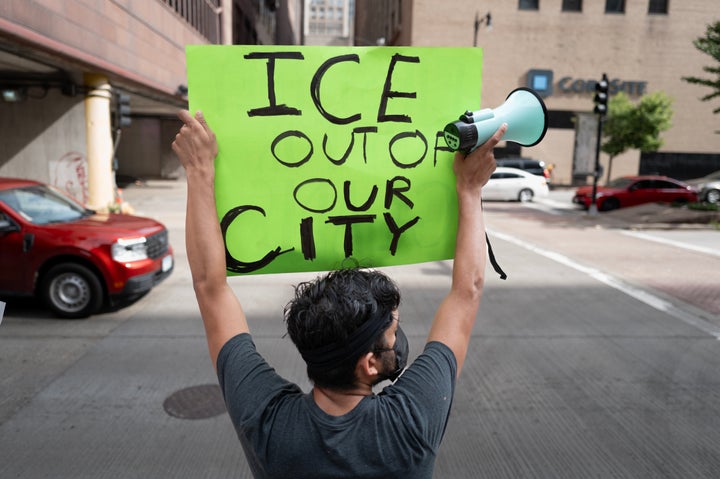 Demonstrators protest outside of an ICE field office on July 28, 2025 in Chicago.