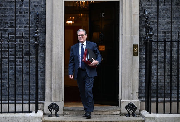 Keir Starmer leaves 10 Downing Street for PMQs.