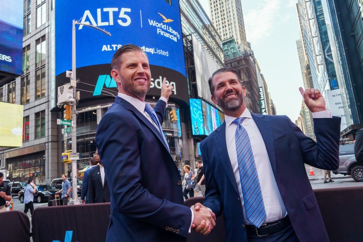 Eric Trump, executive vice president of Trump Organization Inc., left, and Donald Trump Jr., executive vice president of development and acquisitions for Trump Organization Inc., outside of the Nasdaq MarketSite in New York, US, on Wednesday, Aug. 13, 2025. Alt5 Sigma Corp., a Las Vegas-based company that swerved from chronic pain treatment into crypto payments, said in a statement Monday that it was selling shares to raise money to buy World Liberty Financial tokens, a virtual asset tied to the family of US President Donald Trump. Photographer: Adam Gray/Bloomberg via Getty Images