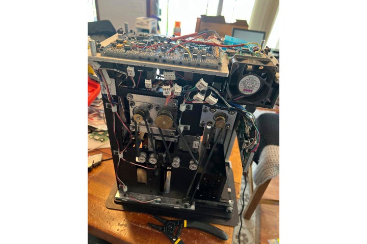 This undated image provided the U.S. Attorney's Office Eastern District of New York, shows a card shuffler allegedly used by defendants in a sports betting and illegal gambling case brought by the U.S. attorney's office of the Eastern District of New York, Thursday, Oct. 23, 2025, in New York. (U.S. Attorney's Office vis AP)