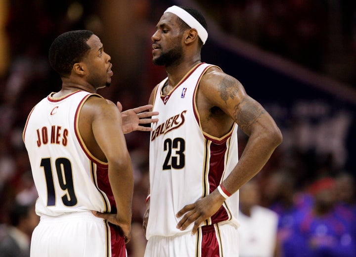 Cleveland Cavaliers' Damon Jones (19) and LeBron James confer late in Game 6 of the NBA basketball Eastern Conference finals against the Detroit Pistons Saturday, June 2, 2007, in Cleveland.