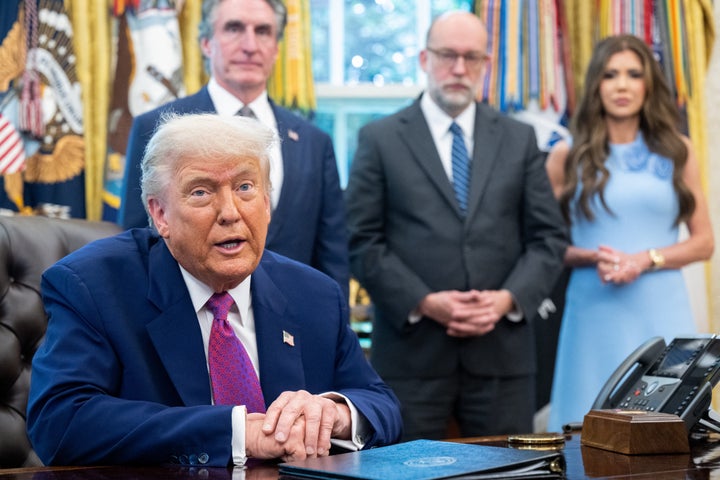 President Donald Trump and OMB Director Russell Vought (center) have engaged in "the most broad set of illegal budget actions of any president in U.S. history," Bobby Kogan said.