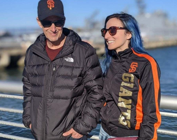 The author and her dad outside of Oracle Park Stadium in 2021.
