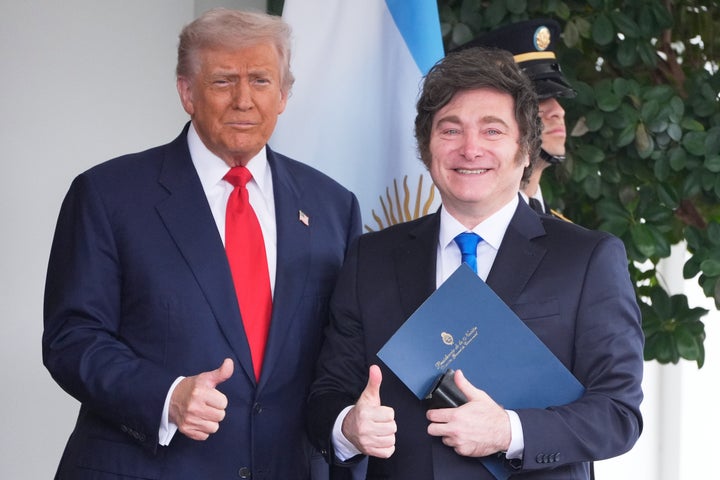 President Donald Trump greets Argentina's President Javier Milei, as he arrives at the White House, on Oct. 14, 2025, in Washington.