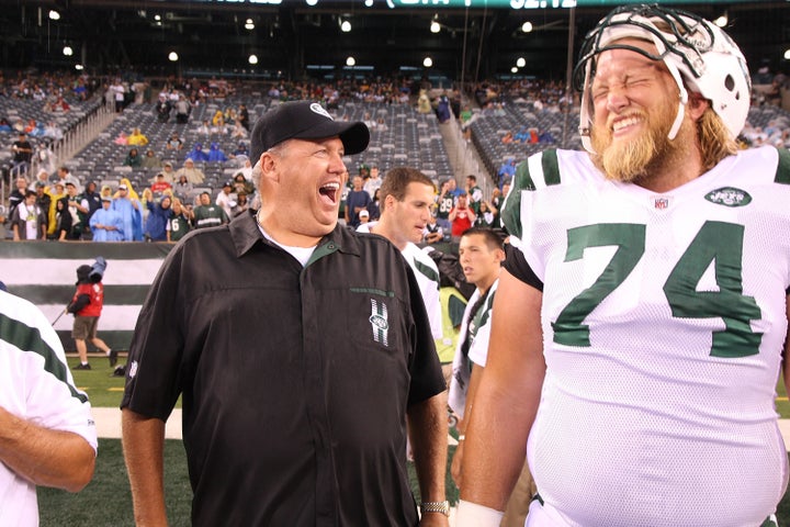 Head coach Rex Ryan with New York Jets center Nick Mangold in 2011. Mangold, an Ohio native, died Saturday less than two weeks after going public with his kidney disease diagnosis.