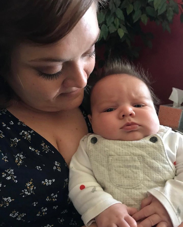 Me with my baby boy, who would grow to hang out in the bathroom with me all the time.