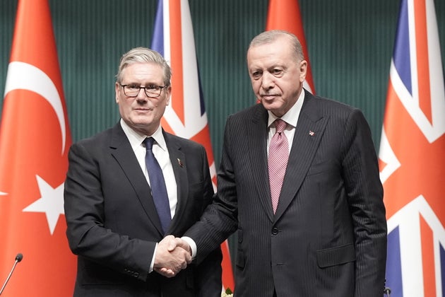 British Prime Minister Keir Starmer, left, and Turkish President Recep Tayyip Erdogan shake hands after signing a deal worth up to '8 billion for 20 UK Typhoon fighter jets, the biggest fighter jet exports deal in a generation, at the Presidential Palace in Ankara, Turkey, Monday, Oct. 27, 2025.
