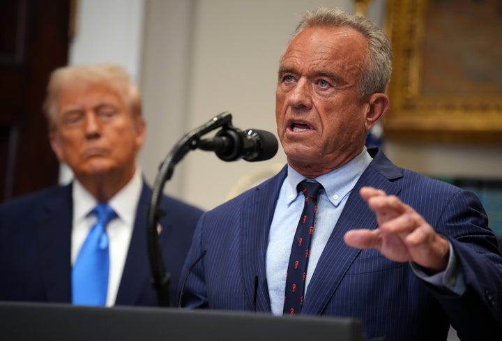 U.S. Health and Human Services Secretary Robert F. Kennedy Jr., joined by President Donald Trump (L), delivers an announcement on “significant medical and scientific findings for America’s children” in the Roosevelt Room of the White House on September 22, 2025 in Washington, DC. (Photo by Andrew Harnik/Getty Images)
