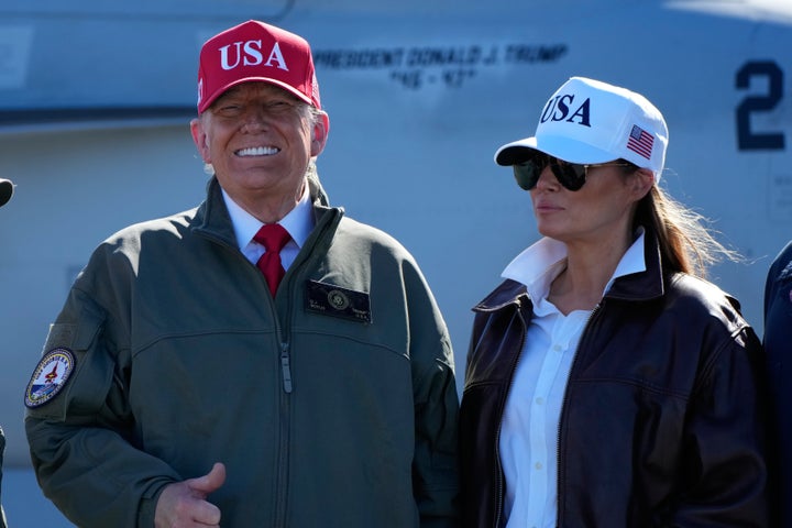 White Home Urged Firing Reside Bombs, Not Dummies, For Trump's Go to To Navy Celebration: AP Sources 2 President Donald Trump and first lady Melania Trump pose in front of a F/A-18E fighter jet with President Donald Trump's name on it, as part of the Navy's 250th anniversary celebration, aboard the USS George H.W. Bush aircraft carrier in the Atlantic Ocean off the coast of Norfolk, Va., Sunday, Oct. 5, 2025. (AP Photo/Alex Brandon)