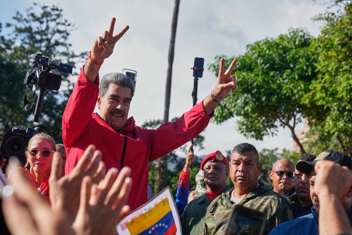 U.S. Sought To Lure Nicolás Maduro’s Pilot Into Betraying The Venezuelan Chief 3 FILE - President Nicolas Maduro flashes victory signs during Indigenous Day in Caracas, Venezuela, Oct 12, 2025. (AP Photo/Ariana Cubillos, File)