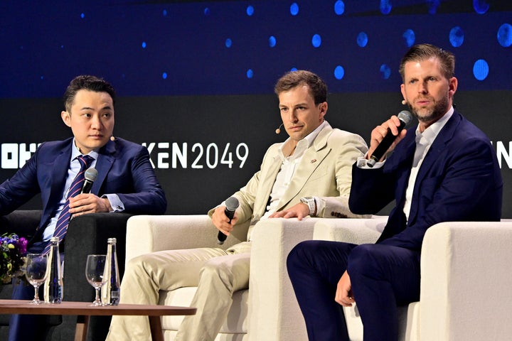 The Trump Organisation executive vice-president Eric Trump (R), World Liberty Financial co-founder Zach Witkoff (C) and cryptomoney exchange Tron Justin Sun (L), participate in a session during the Token 2049 crypto conference in Dubai on May 1, 2025. (Photo by Giuseppe CACACE / AFP) (Photo by GIUSEPPE CACACE/AFP via Getty Images) 