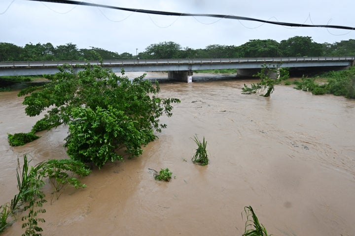 The Rio Cobre comes out of its banks near St. Catherine, Jamaica, shortly before Hurricane Melissa made landfall on Oct. 28, 2025. 