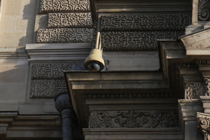 Paris Police Acknowledge Main Gaps In Louvre’s Defenses After Jewel Theft 1 A surveillance camera is seen on a facade of the Louvre museum, three days after historic jewels were stolen in a daring daylight heist, Wednesday, Oct. 22, 2025 in Paris. (AP Photo/Thibault Camus)