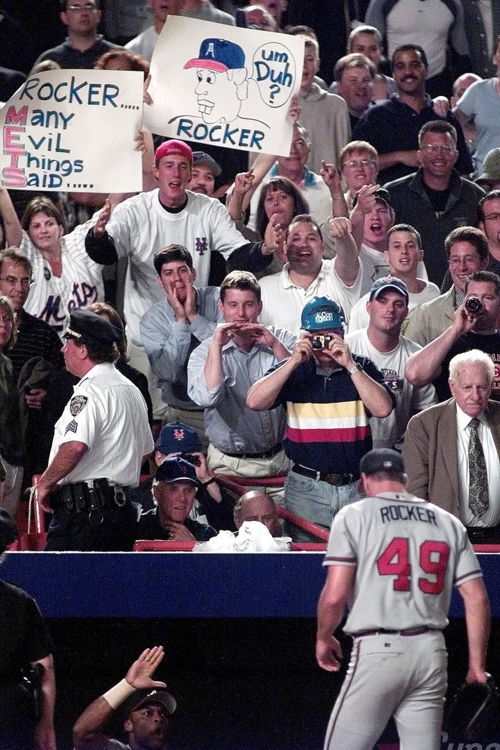 Fans let John Rocker take over after he put the Mets in order during the eighth inning of a game on June 29, 2000 at Shea Stadium.