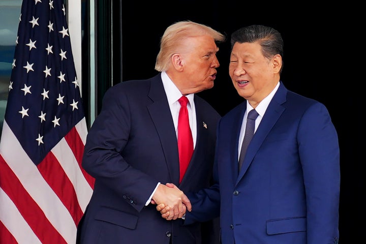 U.S. President Donald Trump and Chinese President Xi Jinping shake hands as they depart following a bilateral meeting at Gimhae Air Base on Oct. 30, 2025, in Busan, South Korea.