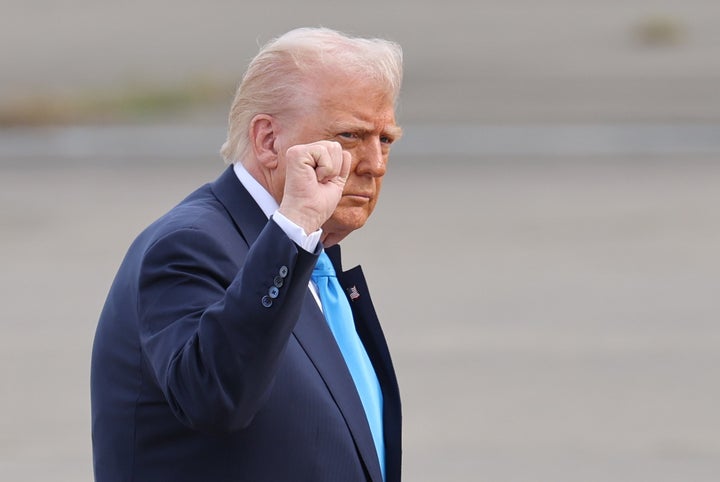 President Donald Trump walks towards Air Force One at Haneda Airport in Tokyo for his departure to South Korea, on Oct. 29, 2025. 