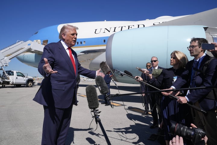 President Donald Trump speaks to the media after arriving at Palm Beach International Airport, Friday, Oct. 31, 2025, in West Palm Beach, Fla.