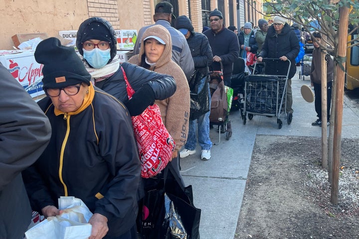 In this photo provided by the Rev. John Udo-Okon, people wait in line for free food at the World of Life Christian Fellowship International food pantry in the Bronx borough of New York on Saturday, Nov. 1, 2025. (Rev. John Udo-Okon via AP)